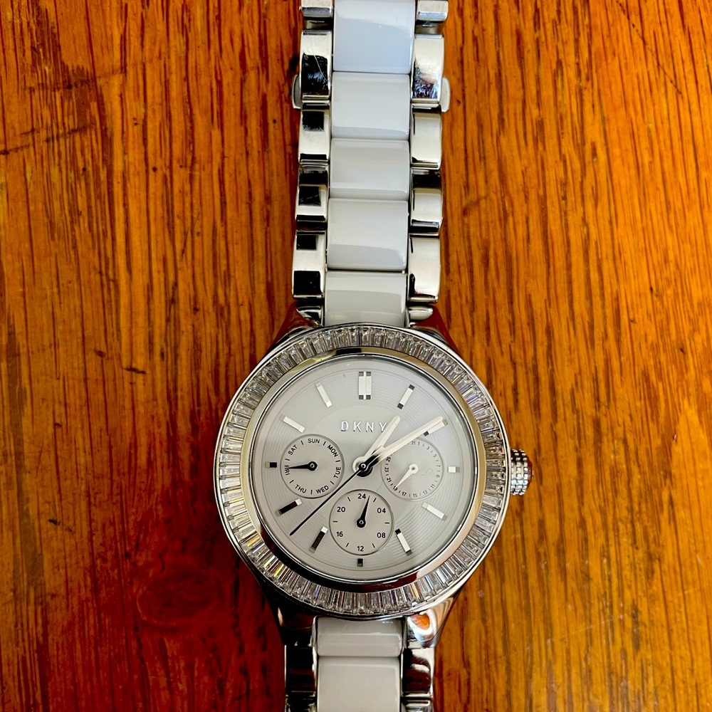 Women’s DKNY Ceramic Chronograph Watch with Crystals White/Silver. Needs battery